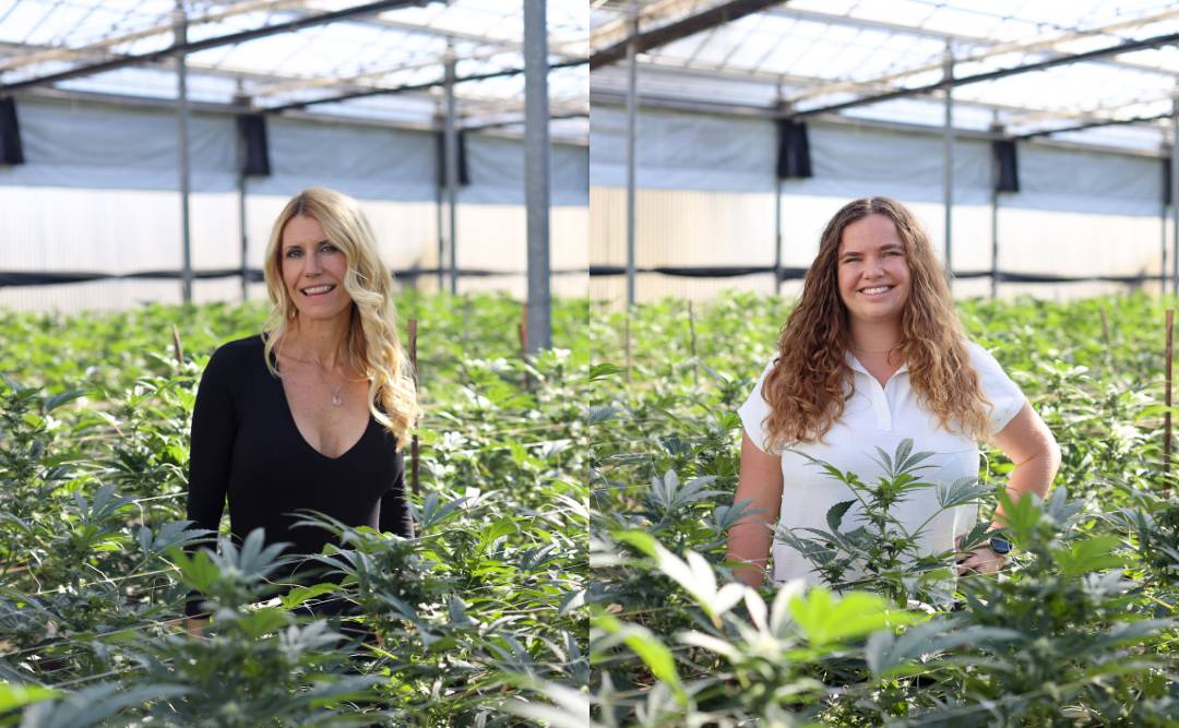 Autumn Shelton and Hanna Brand in a greenhouse of cannabis celebrate Women's History Month